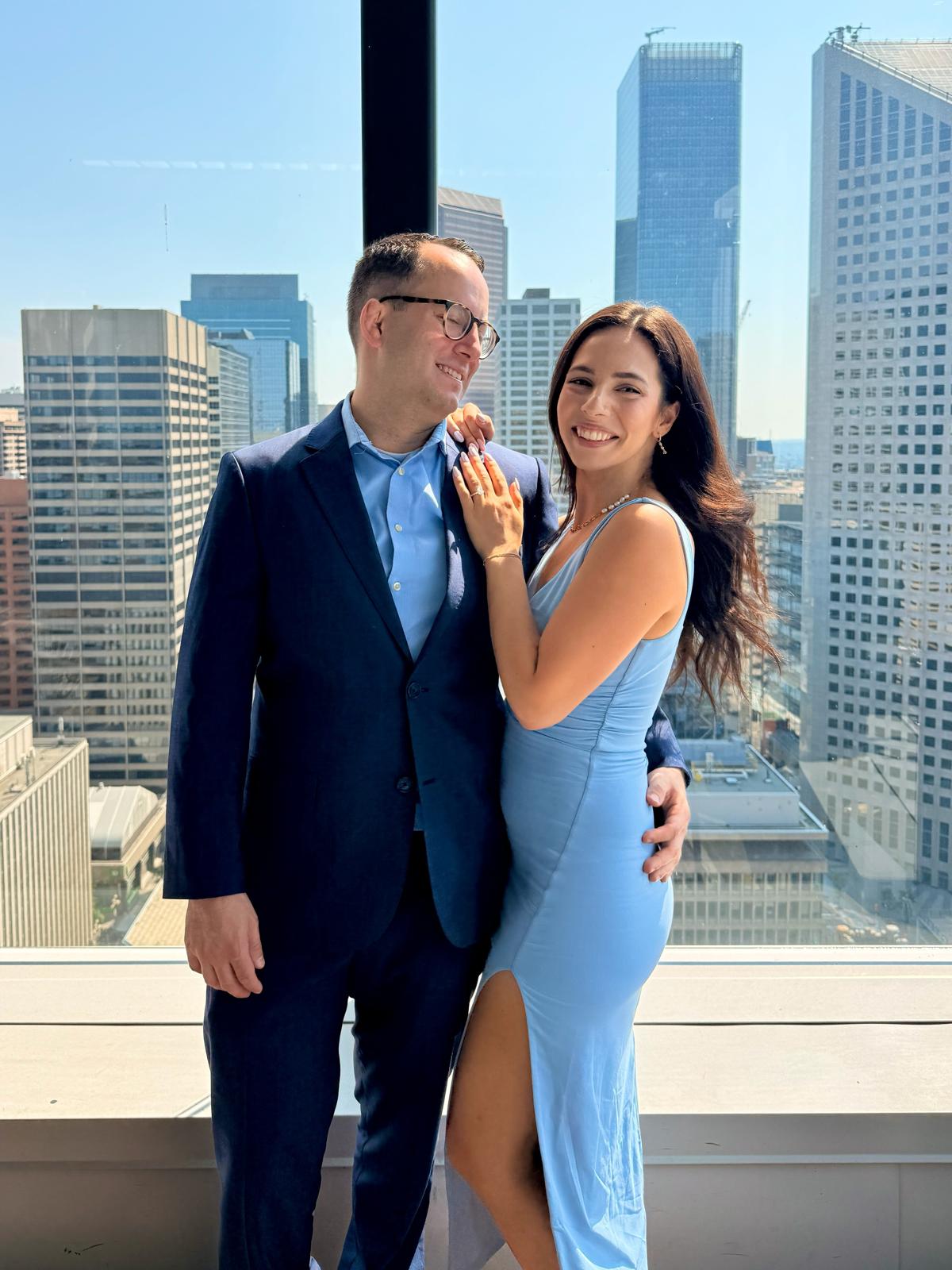 Nathalie and David dressed up downtown
