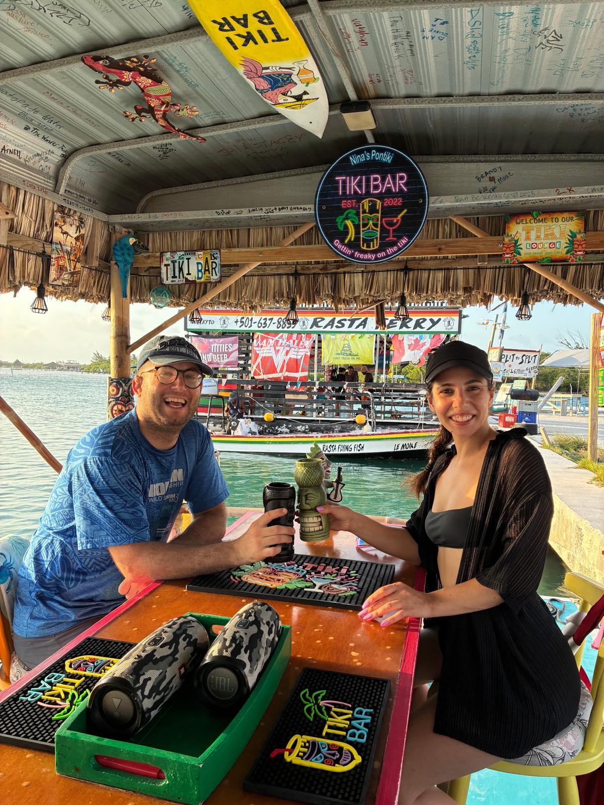 Nathalie and David at a tiki bar in Belize